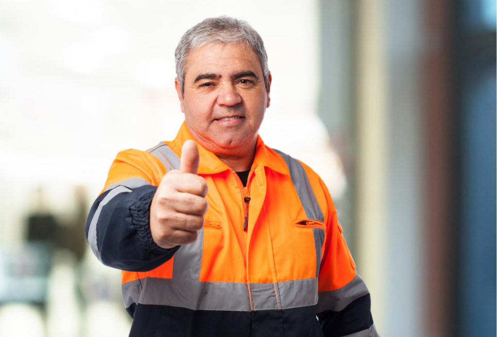Resilient Construction 1 - Lunacon Construction Group old man with reflective suit with thumb up