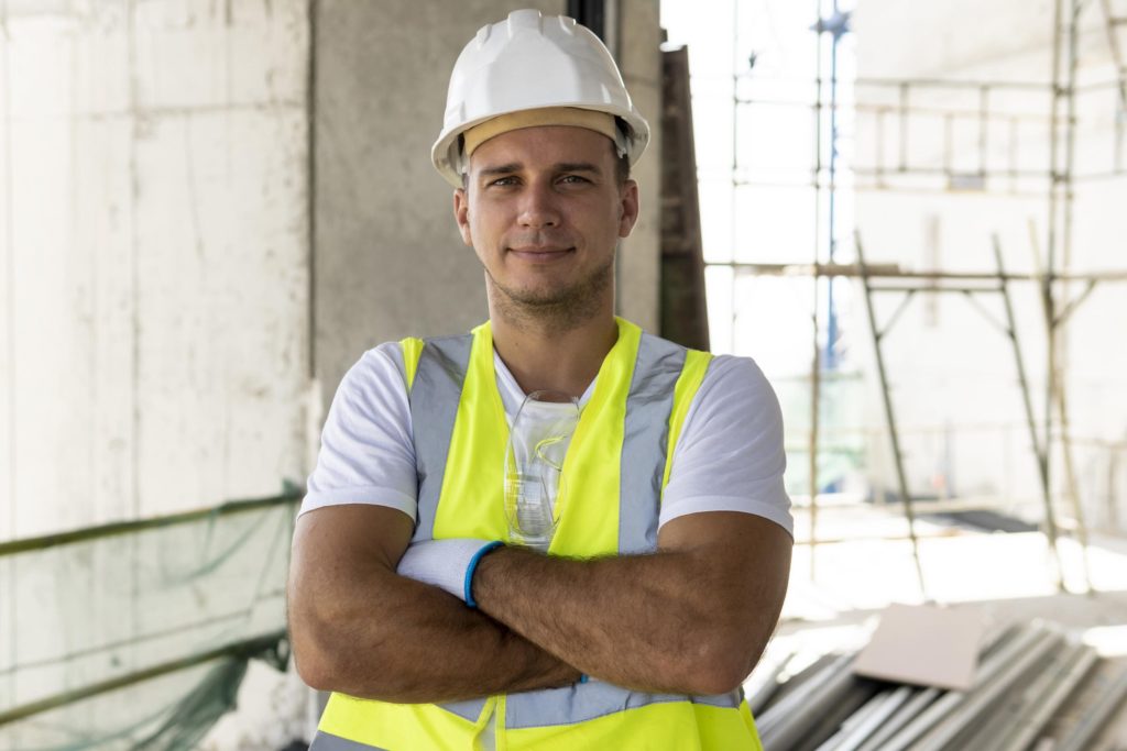 front view worker construction wearing protection gear copia