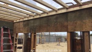 Framing for deck slab in vestibule at loading dock between doors min