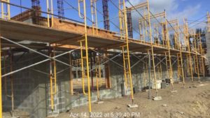 Scaffolding moved from inside to outside to allow to schedule plumbing rough in for restrooms min
